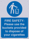 fire-safety-please-use-the-buckets-provided-to-dispose-of-your-cigarettes~